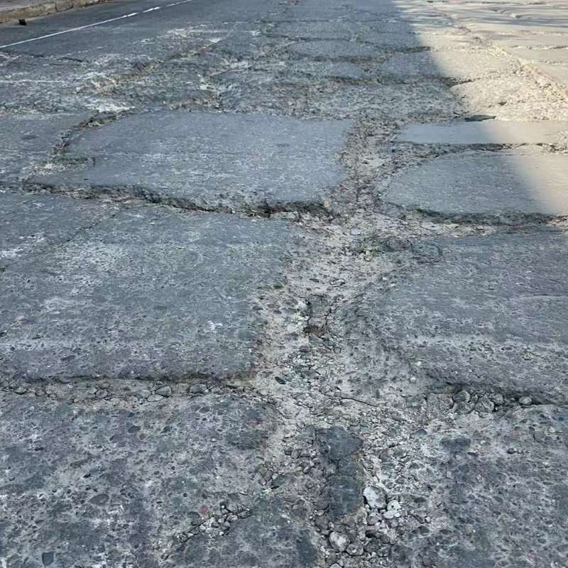 称多路面起砂露石子修补料